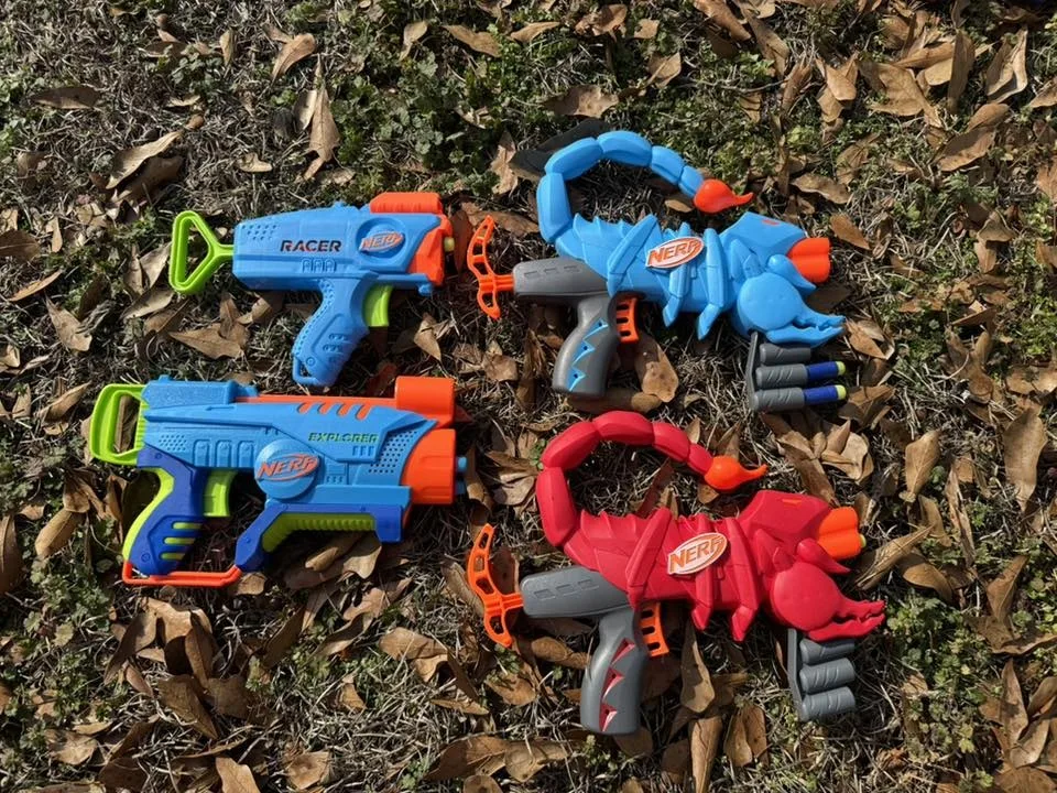 Four kid-friendly Nerf blasters including easy-pull scorpion models